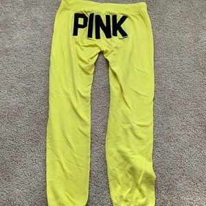 PINK joggers (yellow) with black lettering